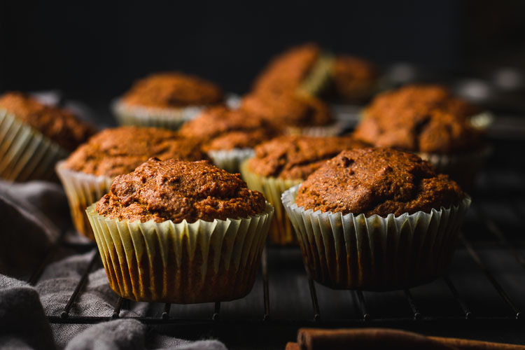 healthy vegan pumpkin muffins cooling on a rack