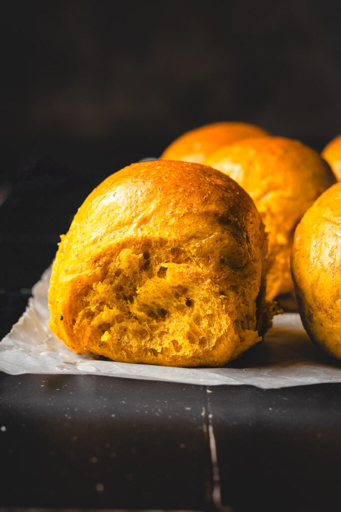 vegan pumpkin dinner rolls close up