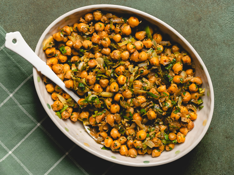 sesame lemon chickpeas in serving bowl with spoon