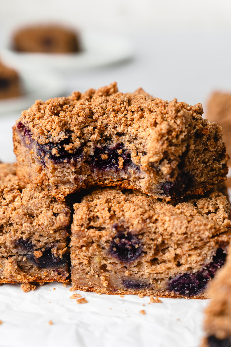 blueberry banana coffee cake with a bite taken out of it