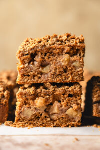 two pieces of apple coffee cake stacked