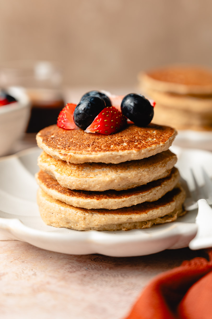 tofu banana pancake stack with berries on top