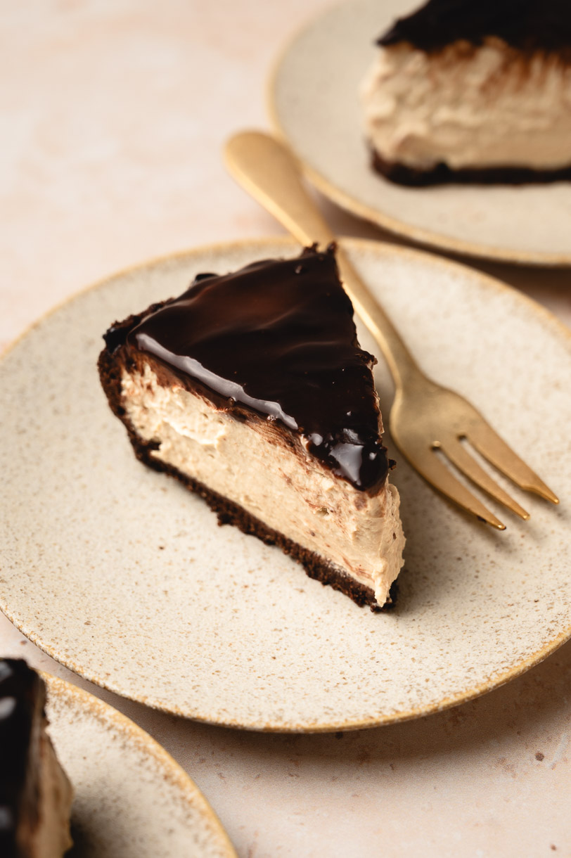 slices of vegan chocolate peanut butter pie on plates